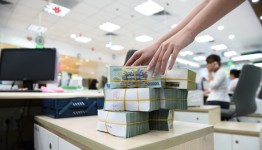 Ngân hàng Nhà nước gỡ khó thanh khoản cho nhà băng quốc doanh