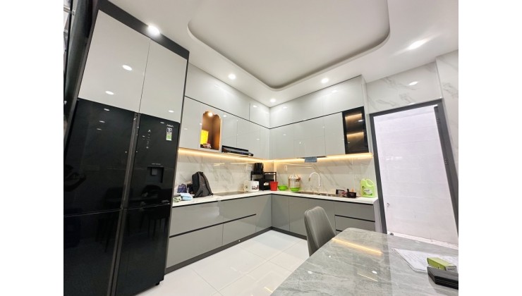 Bán nhà Q.10 4T 63m2 MT 4.3m ô tô trong nhà 12 tỷ.